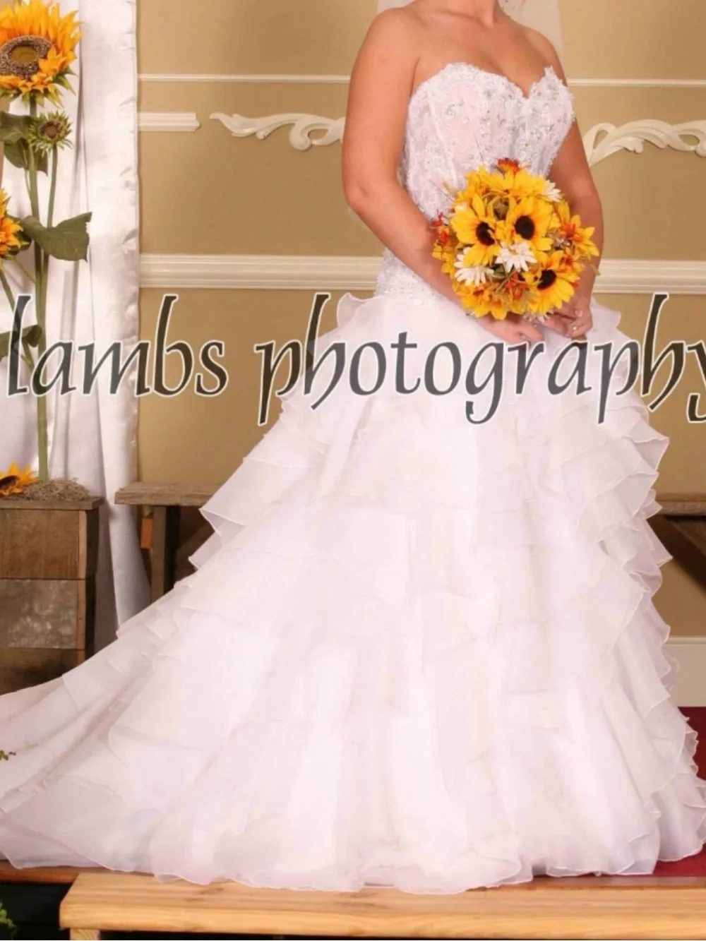 Oleg Cassini White Strapless Bridal Portrait with Sunflower Bouquet